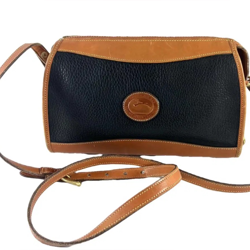 Dooney & Bourke Black And Tan Leather Pebble Crossbody